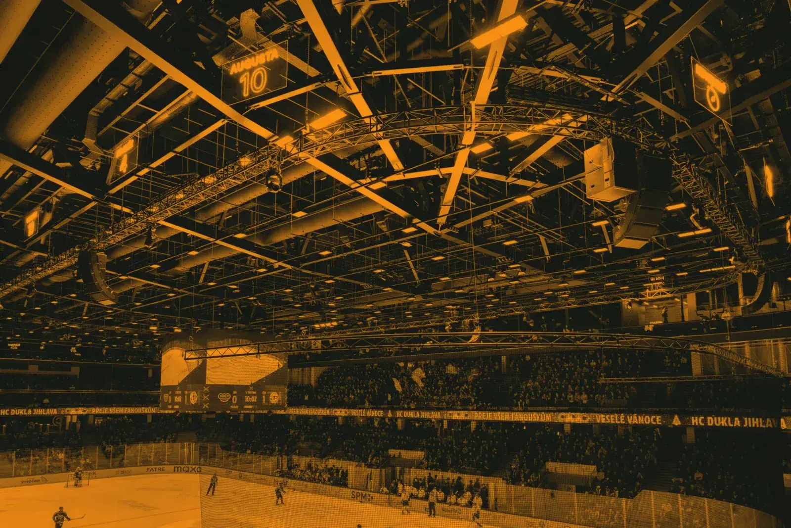 Box truss spans in a venue