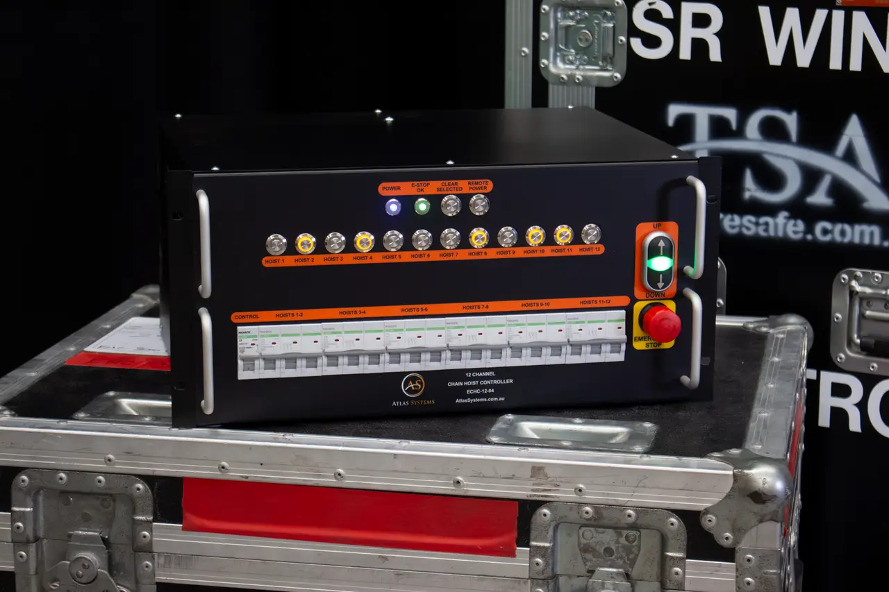 Atlas ECHC-12 twelve-channel chain hoist controller on a TSA flight case, with a button for each hoist and an emergency stop.