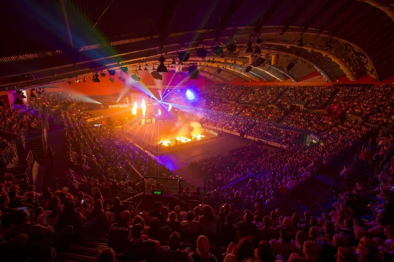 Large arena show with pyrotechnics and laser lighting in front of a packed crowd at Cairns Convention Centre