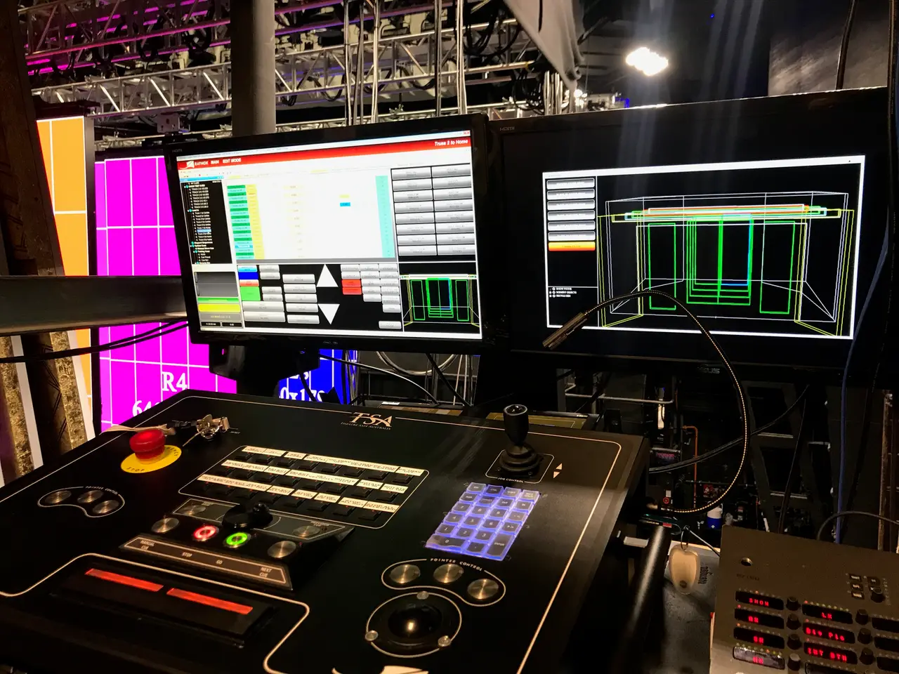 TSA automation control console with dual monitors running rigging show-control software backstage