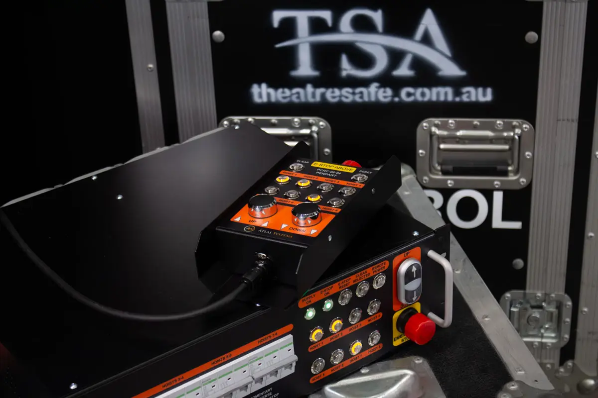 Atlas hoist controller pendant resting on a TSA-branded road case