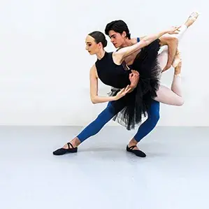 Studio mirrors along a ballet studio wall