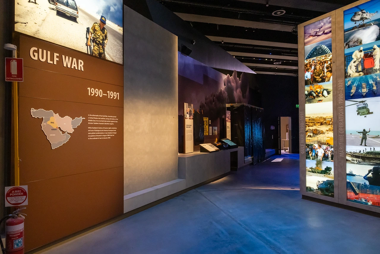 Gulf War zone with printed wall, map graphic and backlit photo tower