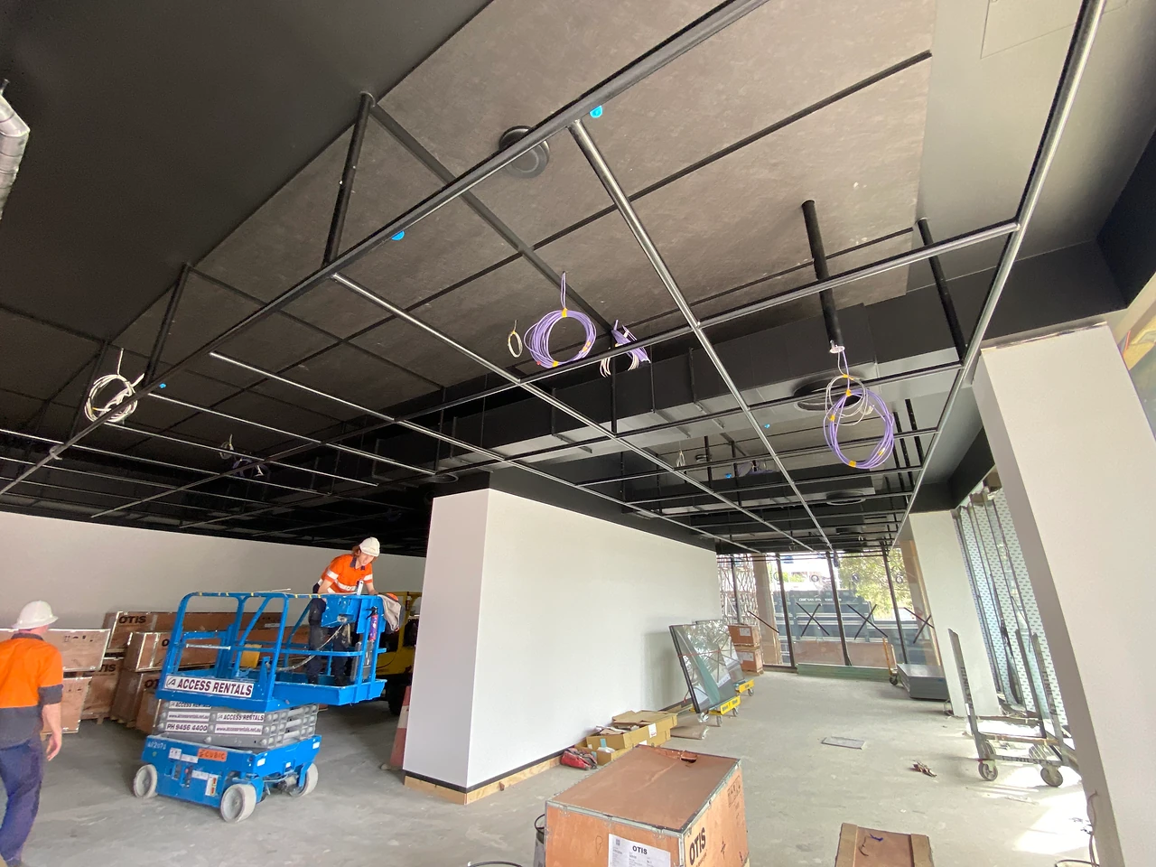The completed modular pipe grid in University Gallery 1 at ECU City Campus.