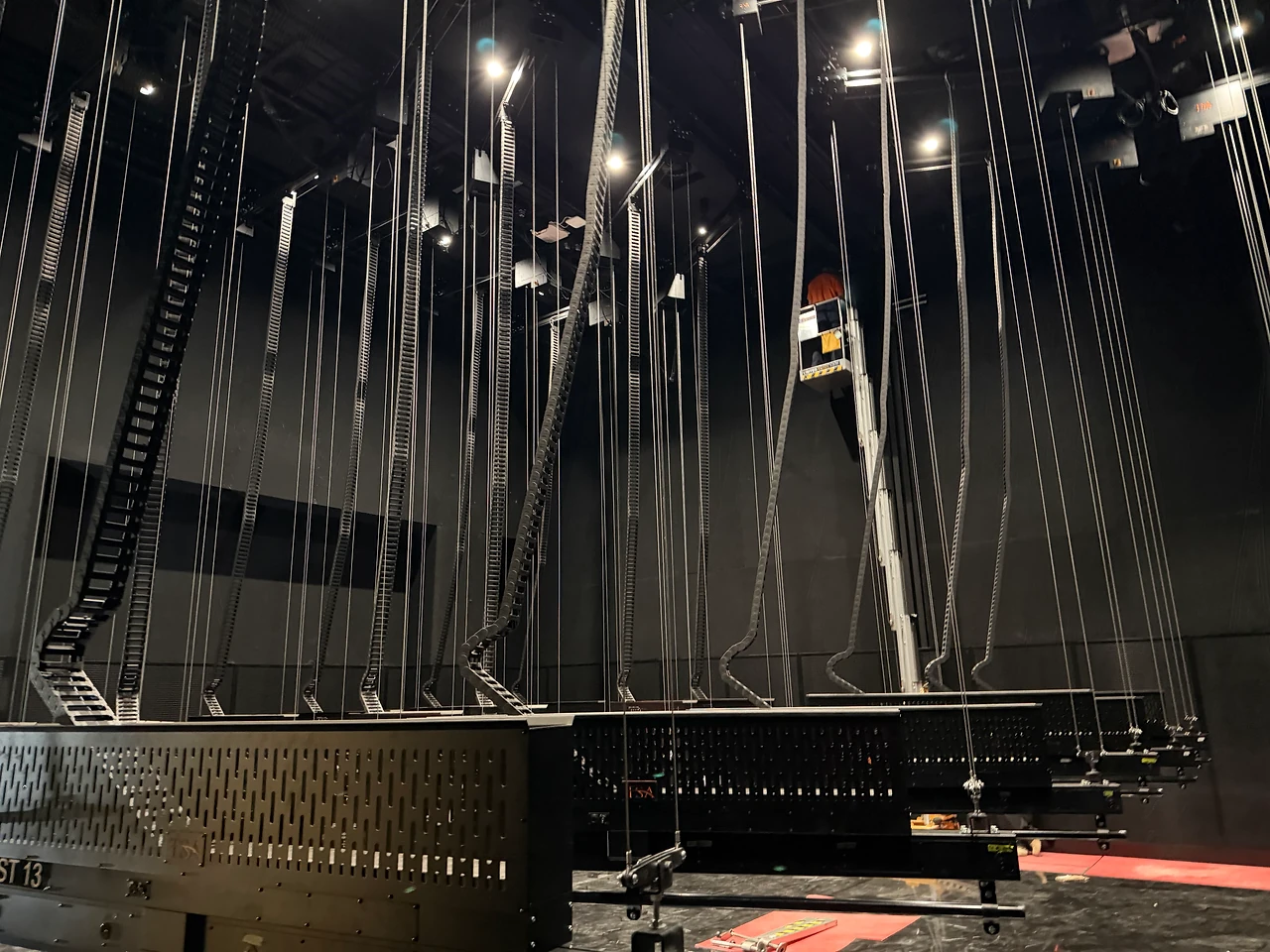 Droppers and suspension lines through the black box studio at ECU City Campus.