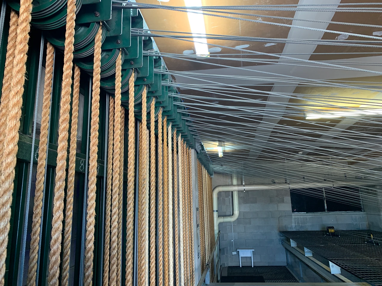 Counterweight lines converging across the fly floor at Gladstone.