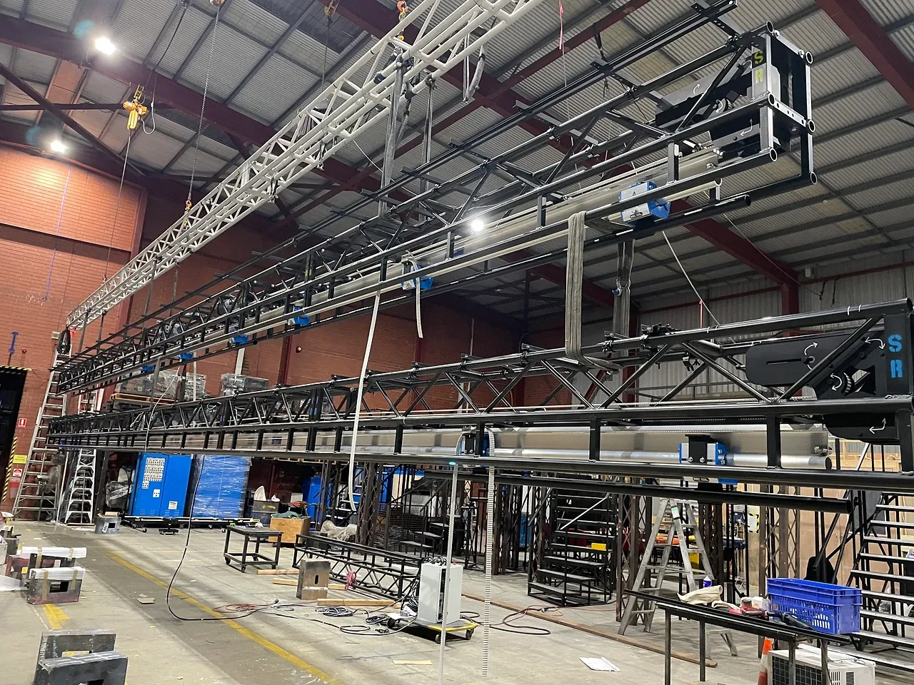 The Wicked performer-flying truss and track assemblies suspended in the TSA workshop for testing.